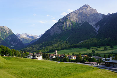 Village at the foot of mountains in Switzerland