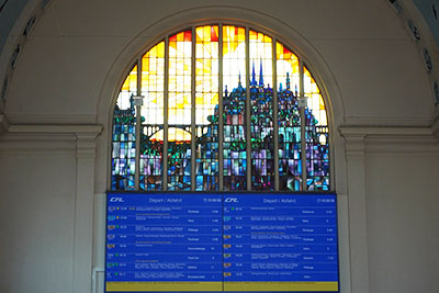 Stained glass over timetables in Luxembourg train station