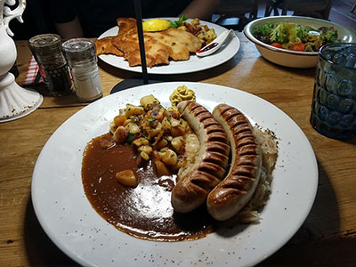 Bratwurst and Wiener schnitzel at a restaurant in Koblenz