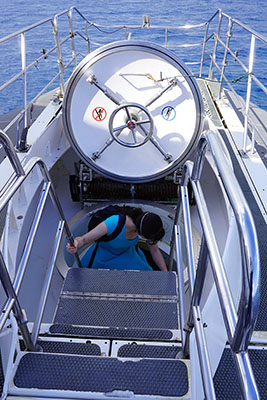 Tamara entering the submarine