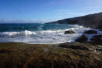 Ocean at Green Sand Beach, with splashed lens